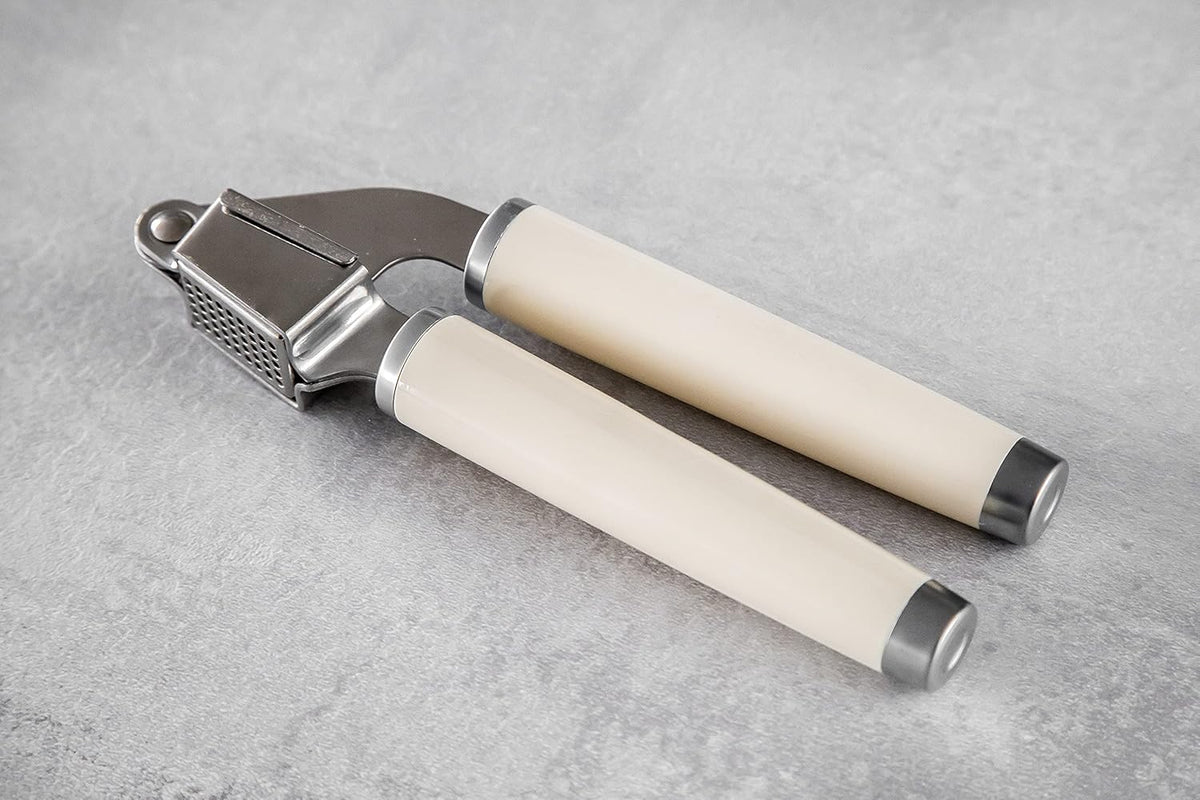 KitchenAid Garlic Press Crusher, Strong Stainless Kitchen Utensil, Removable Basket, Almond Cream
